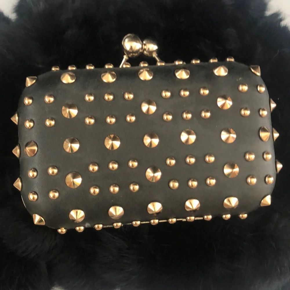 Black studded clutch